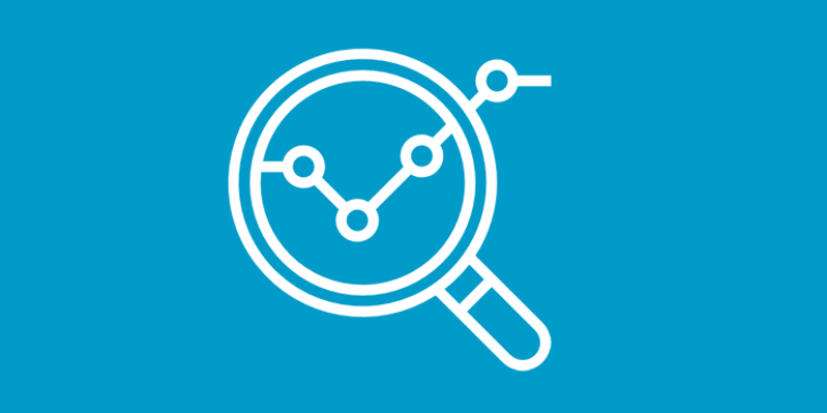 Magnifying glass looking at trend line