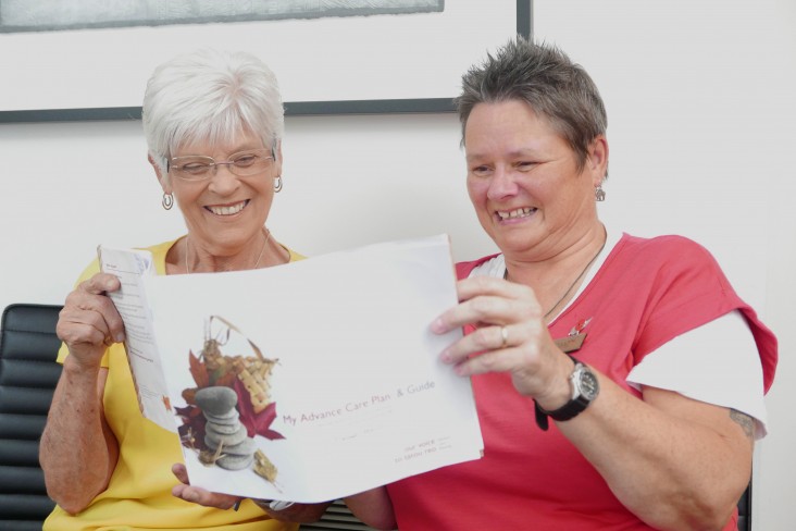 two women reading an Advanced Care Plan