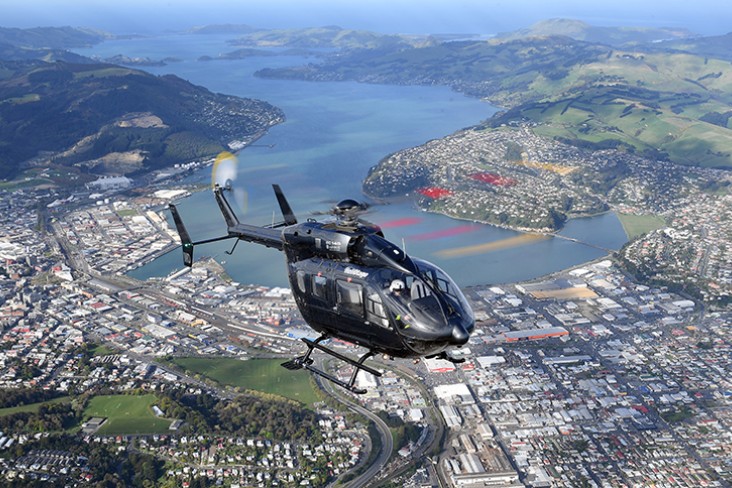 Helicopter flying over dunedin