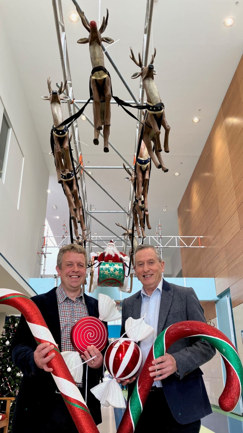 Southland Hospital General Manager Simon Donlevy, left, with H&J Smith Ltd chief executive officer John Green, with some of the festive decorations the department store has donated. Santa and his reindeer can be found in the main foyer of the hospital.