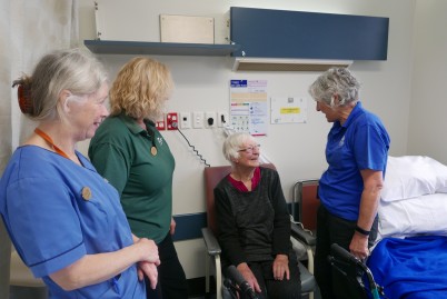 Opal team talking to patient