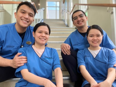 Jerico Esquerra with his wife Clarise, on the left, and Pauz Diaz with his wife Claire. 